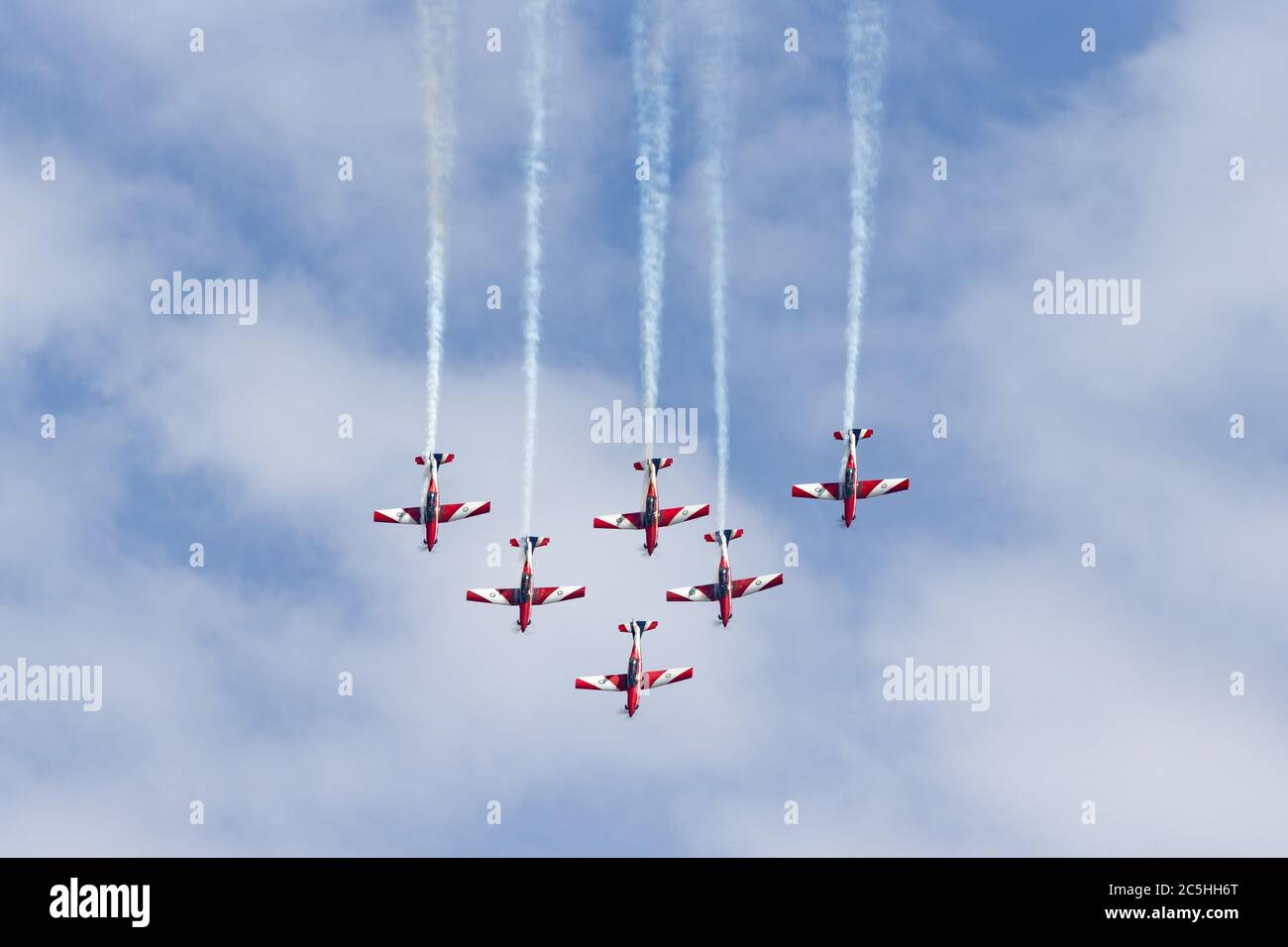 Royal Australian Air Force (RAAF) Roulettes formation aerobatic display team performing an aerial display in Pilatus PC-9A Trainer aircraft. Stock Photo