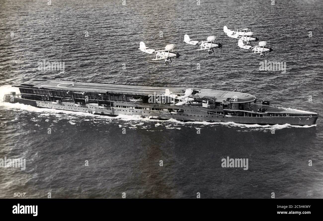 HMS FURIOUS (47)  Royal Navy battlecruiser modified as an aircraft carrier during construction.  With her Fairy Swordfish aircraft about 1935. Stock Photo