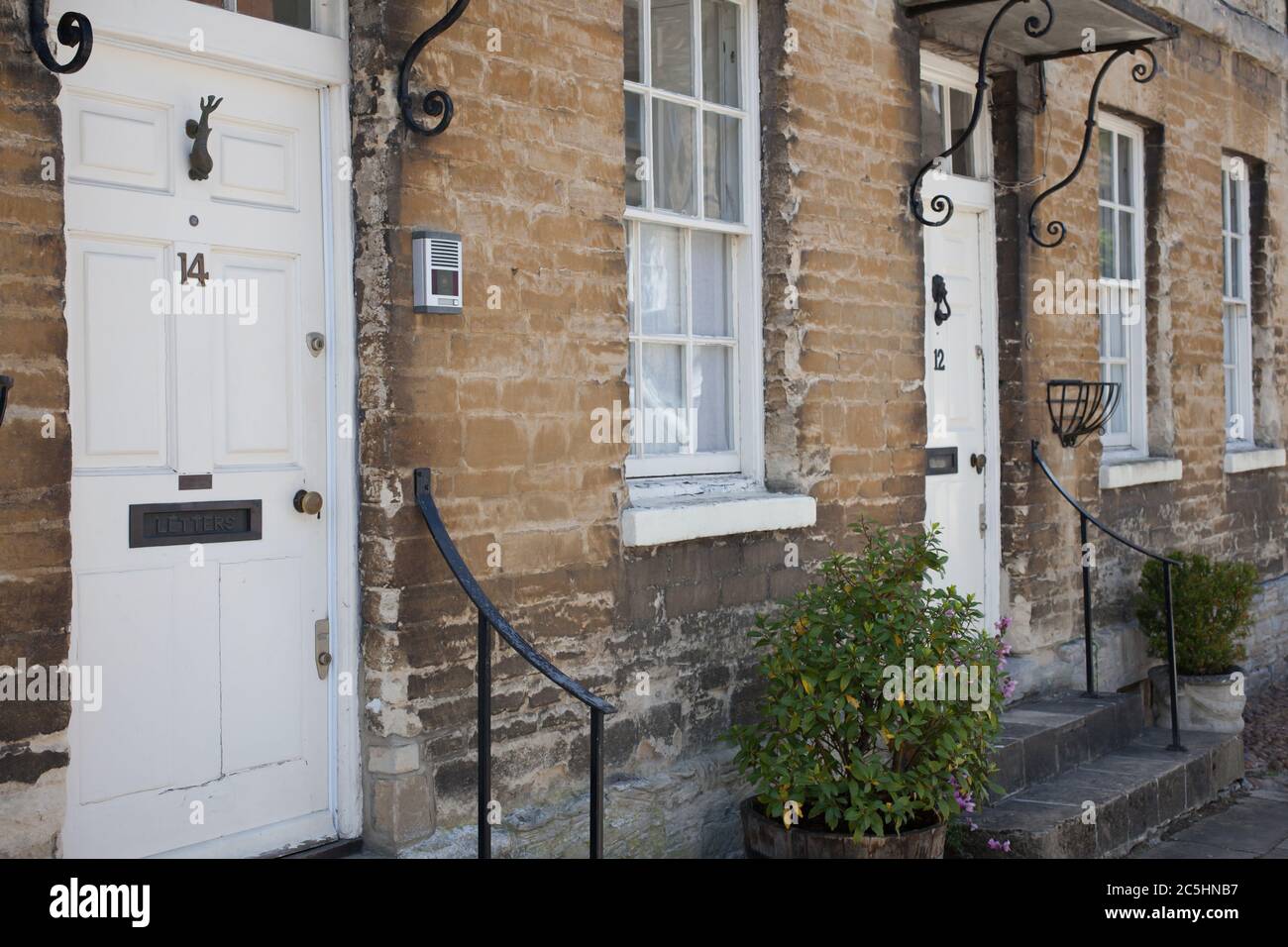 Residential properties on The High Street in Woodstock, Oxfordshire in the UK Stock Photo