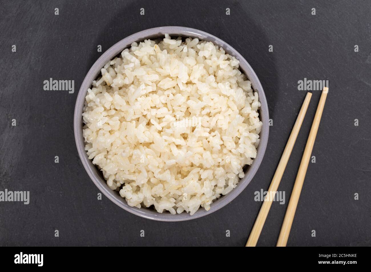 Cooked rice in bowl hi-res stock photography and images - Alamy