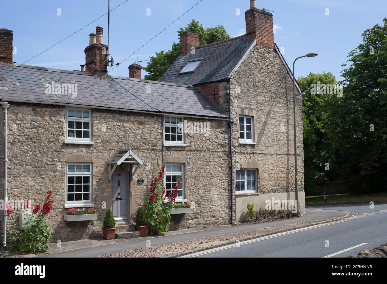 Stone houses on Oxford Street in Woodstock in Oxfordshire in the UK Stock Photo