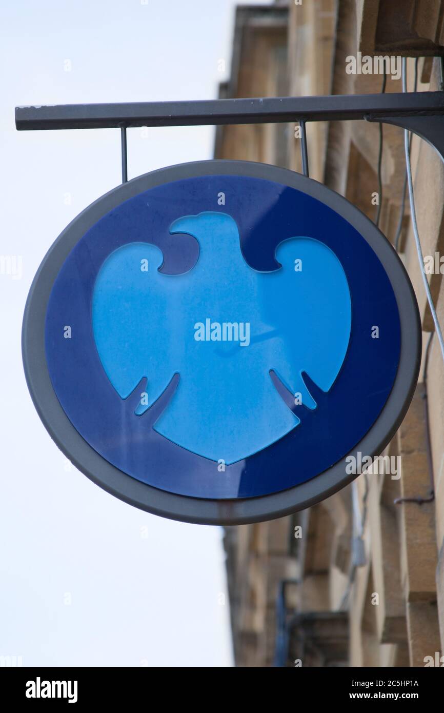 The Barclays Bank logo hanging from a branch in the UK Stock Photo