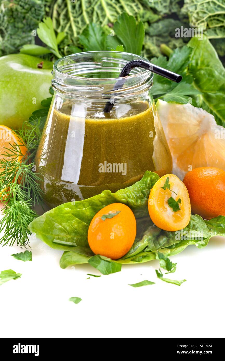 Fresh homemade green smoothie with various fruits and vegetables. Energizing and vitamin smoothie. Detox, and an antioxidant drink. Stock Photo