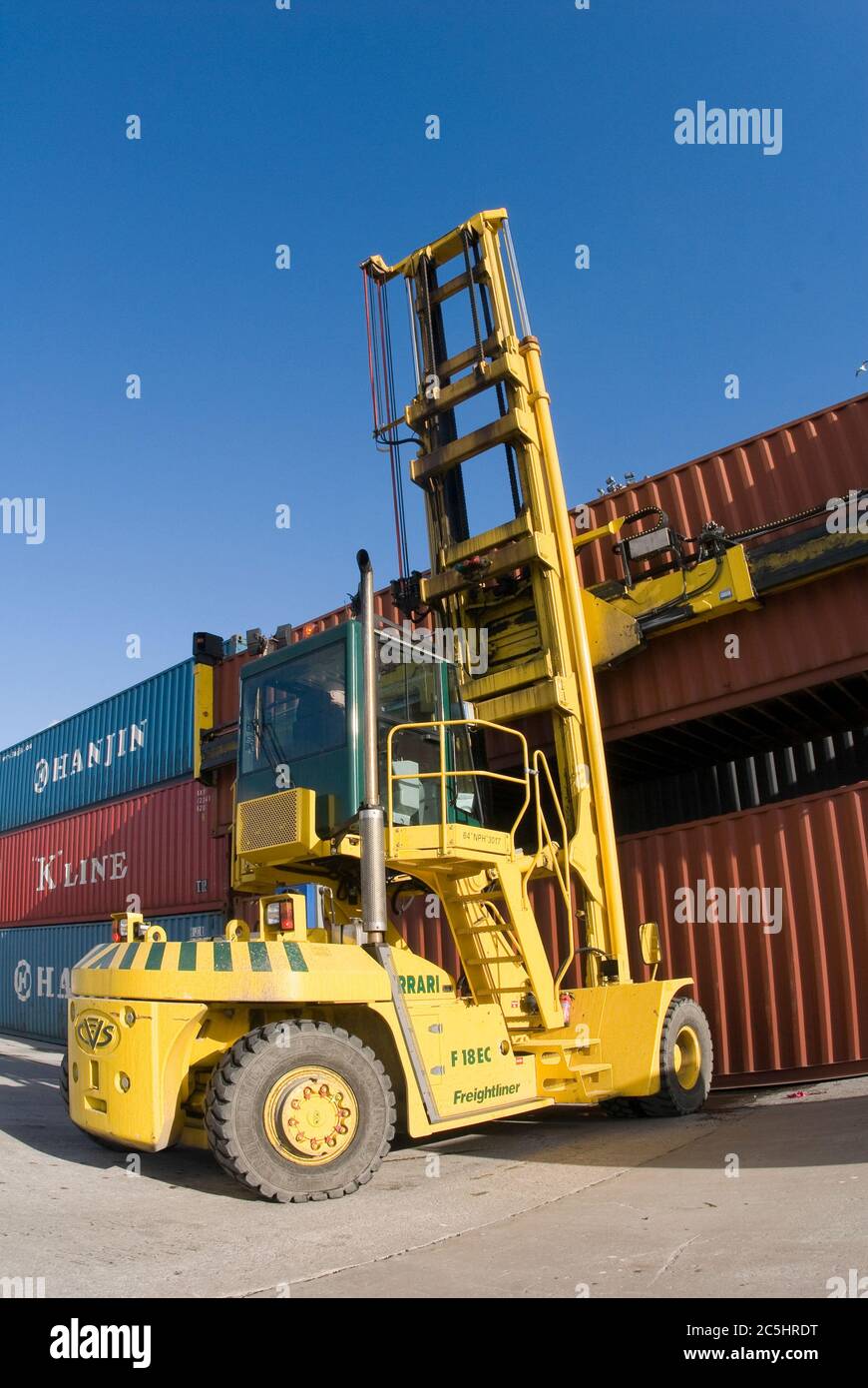 CVS Ferrari container handler being used to move shipping containers at Manchester Euroterminal, Trafford Park, Manchester, England. Stock Photo