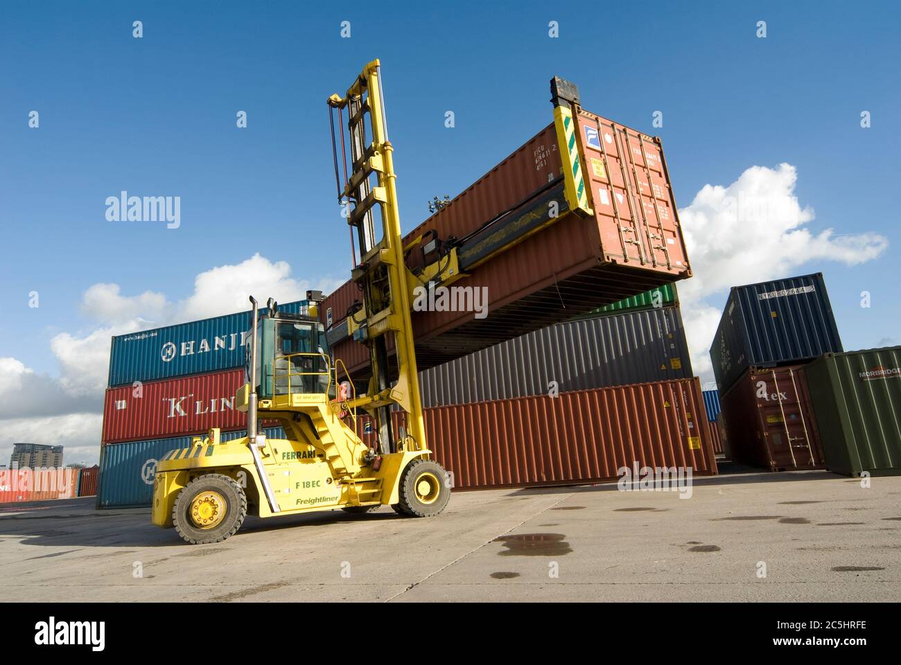 CVS Ferrari container handler being used to move shipping containers at Manchester Euroterminal, Trafford Park, Manchester, England. Stock Photo