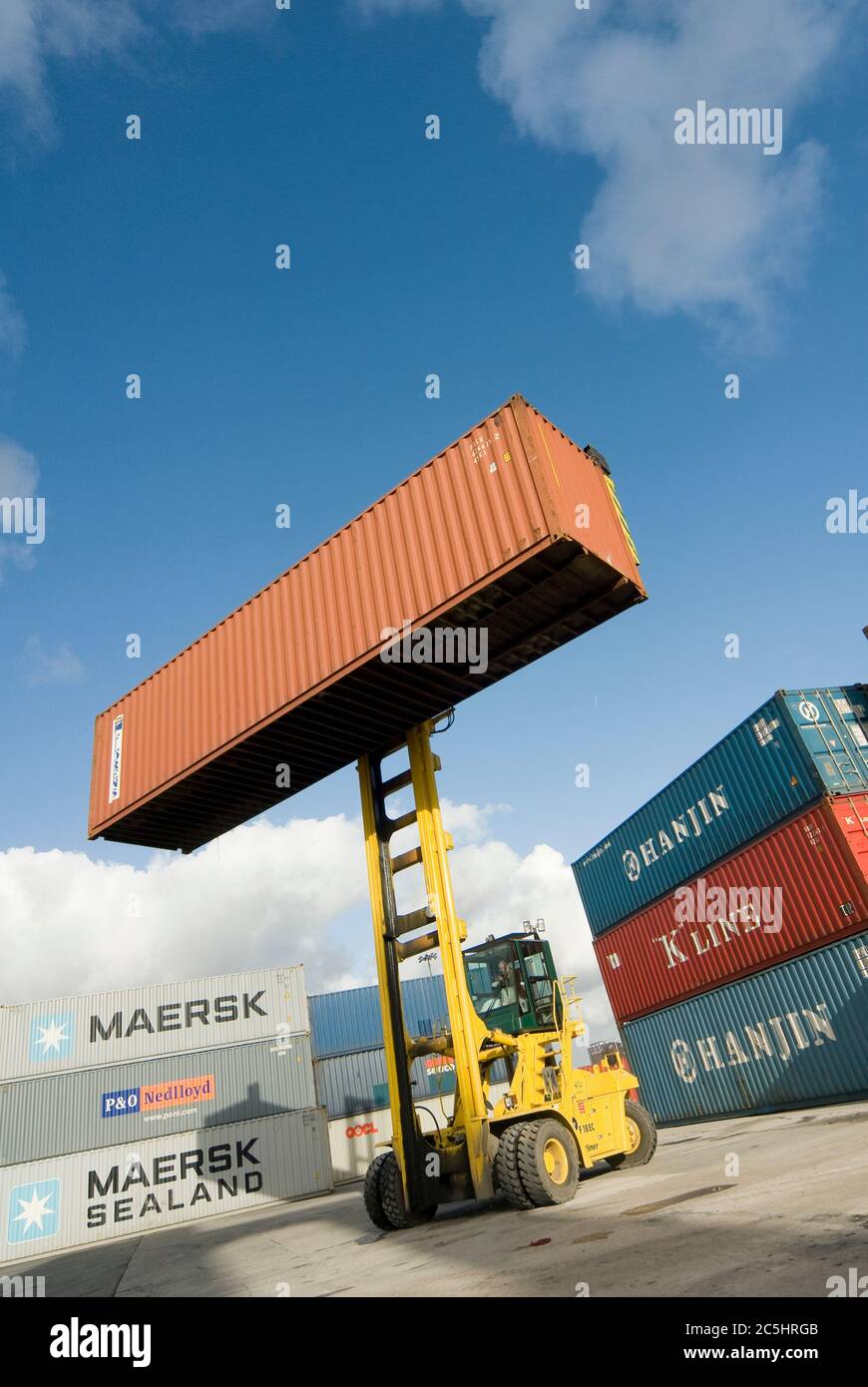 CVS Ferrari container handler being used to move shipping containers at Manchester Euroterminal, Trafford Park, Manchester, England. Stock Photo