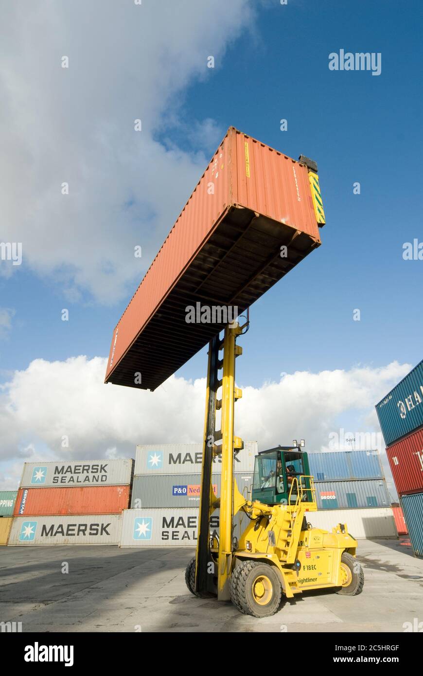 CVS Ferrari container handler being used to move shipping containers at