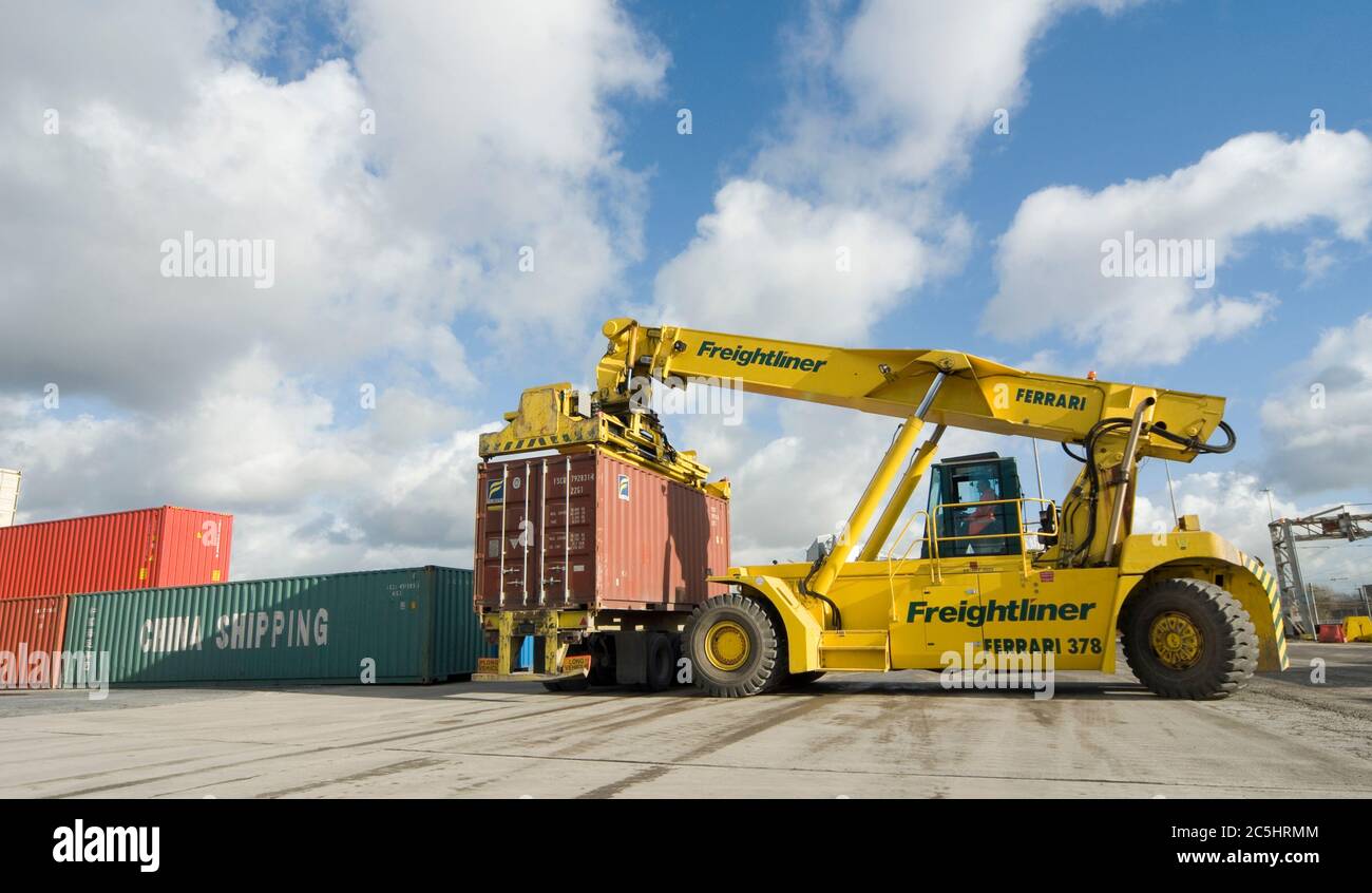 CVS Ferrari reach stacker being used to move shipping containers at Manchester Euroterminal, Trafford Park, Manchester, England. Stock Photo