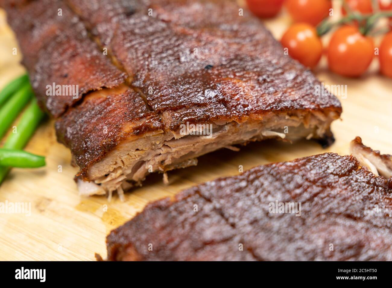 Oven baked BBQ pork ribs Stock Photo