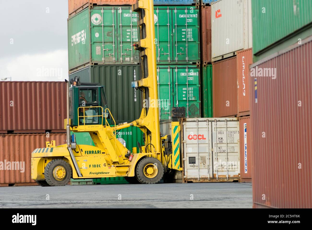 CVS Ferrari container handler being used to move shipping containers at