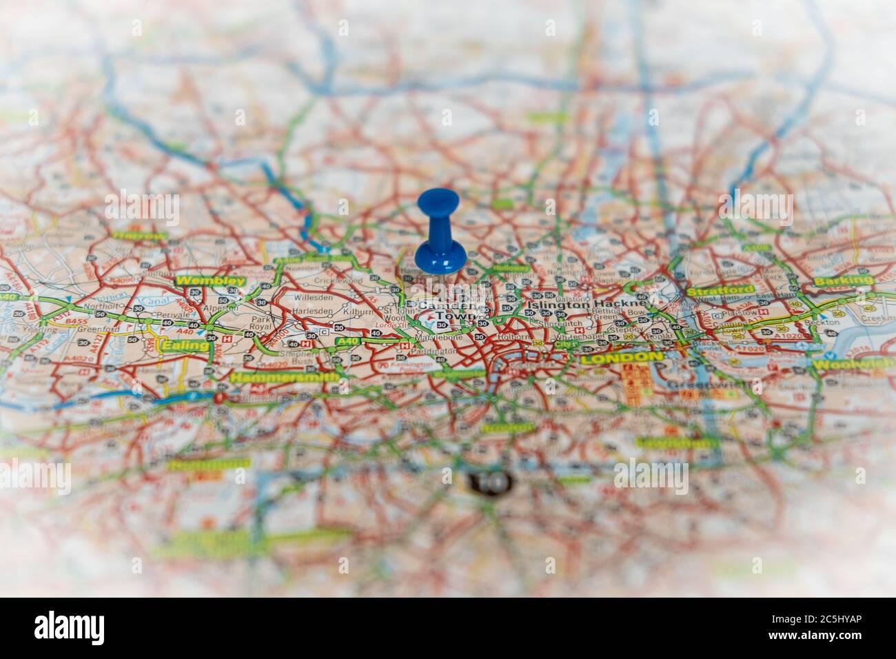 Shallow focus view of a blue push pin seen located in the heart of England's capital city. Stock Photo