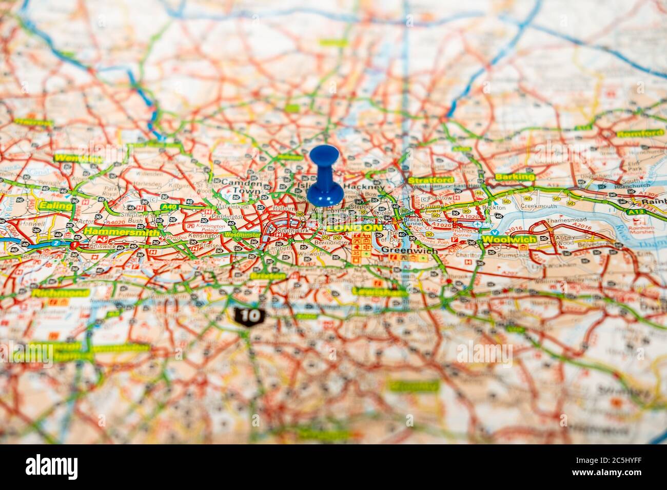 Shallow focus view of a blue push pin seen located in the heart of England's capital city. Stock Photo