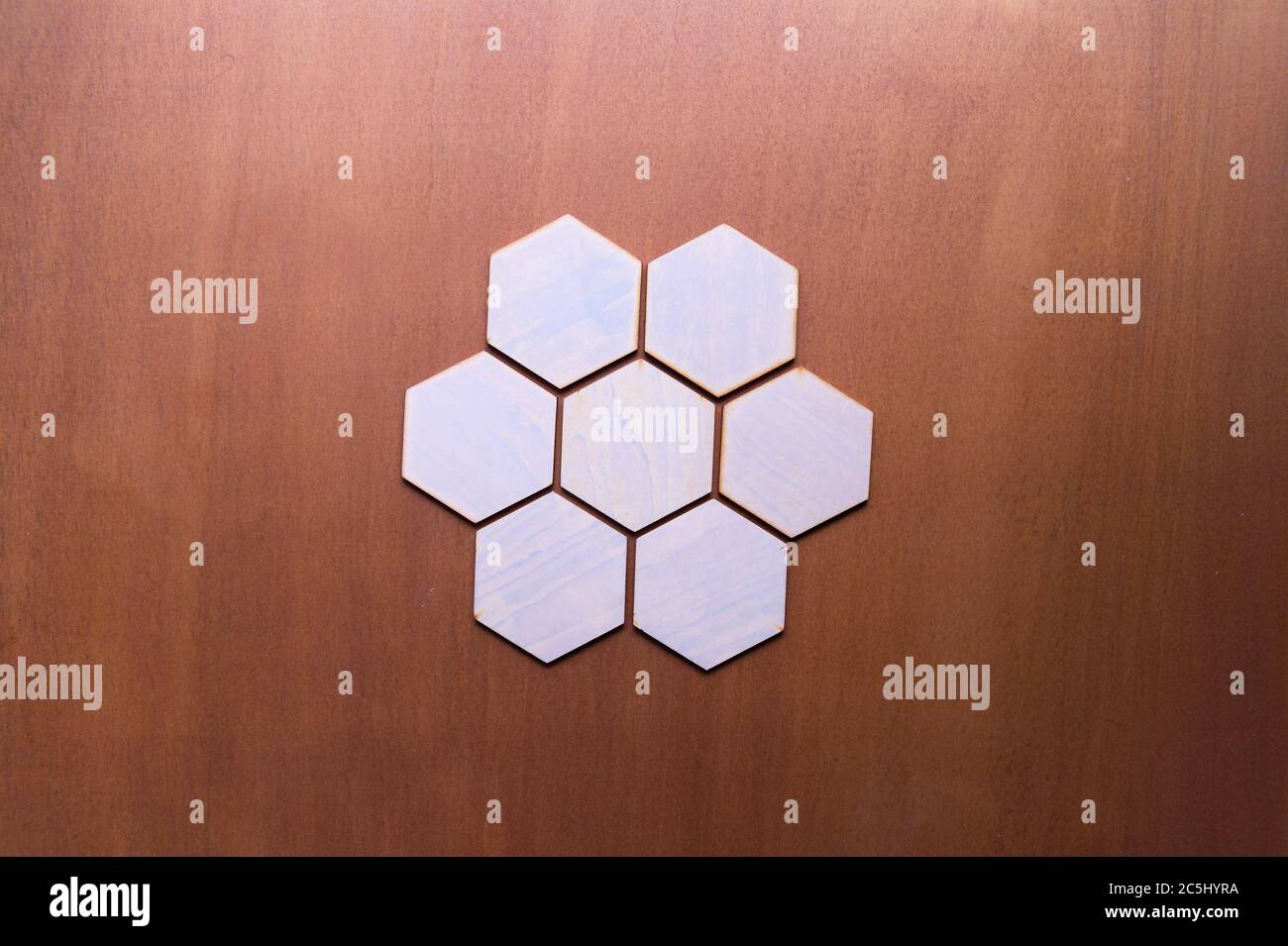 A simple white texture pattern of hexagons as a background Stock Photo