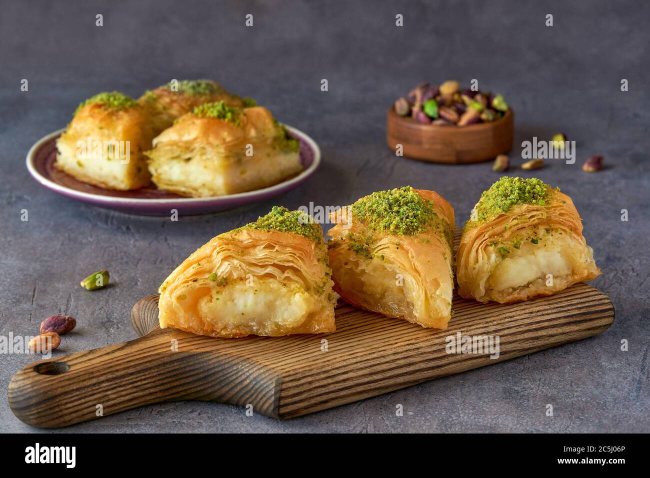 Sweets arabic dessert kunefe, kunafa, kadayif with pistachio and cheese
