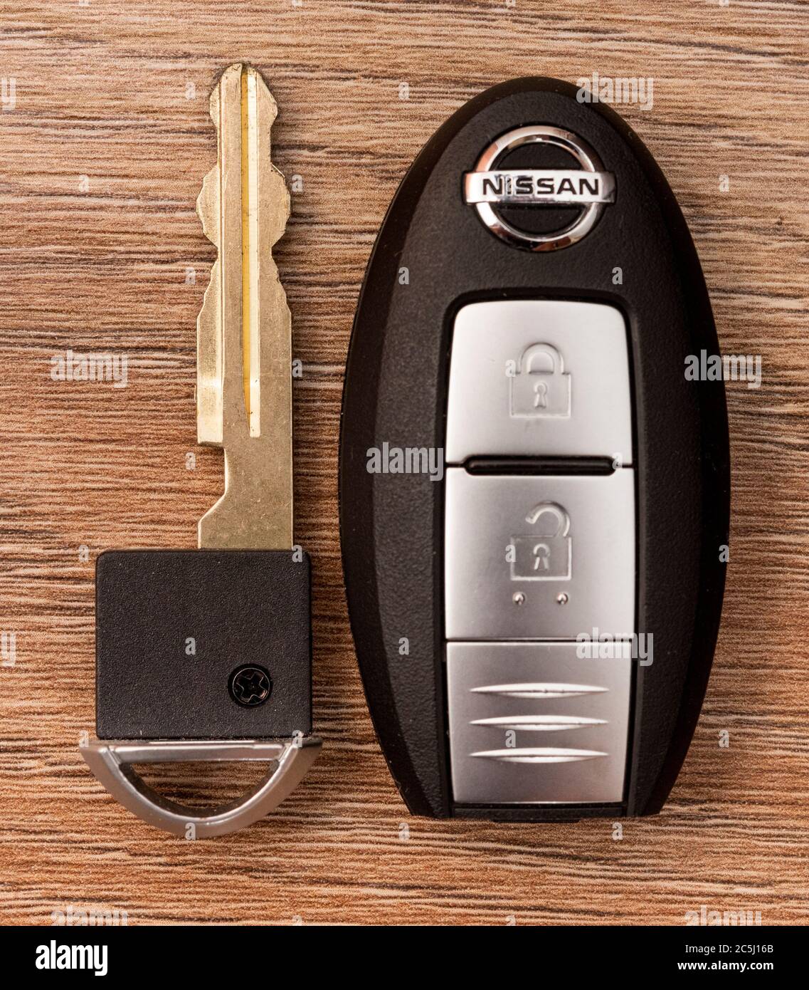 Close up car keys and electronic fob on a wooden background Stock Photo