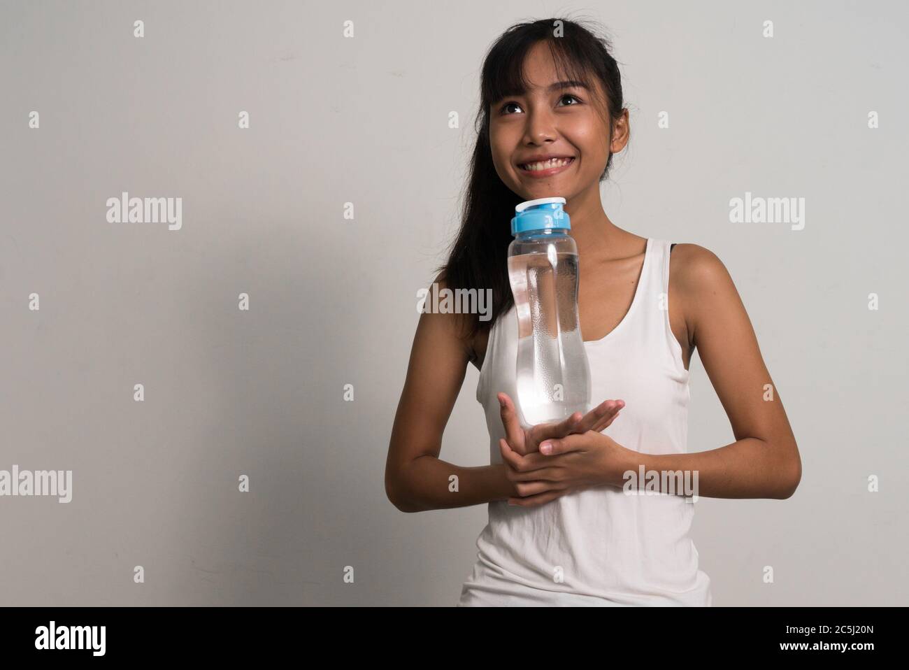 Teenage girl water bottle hi-res stock photography and images - Alamy