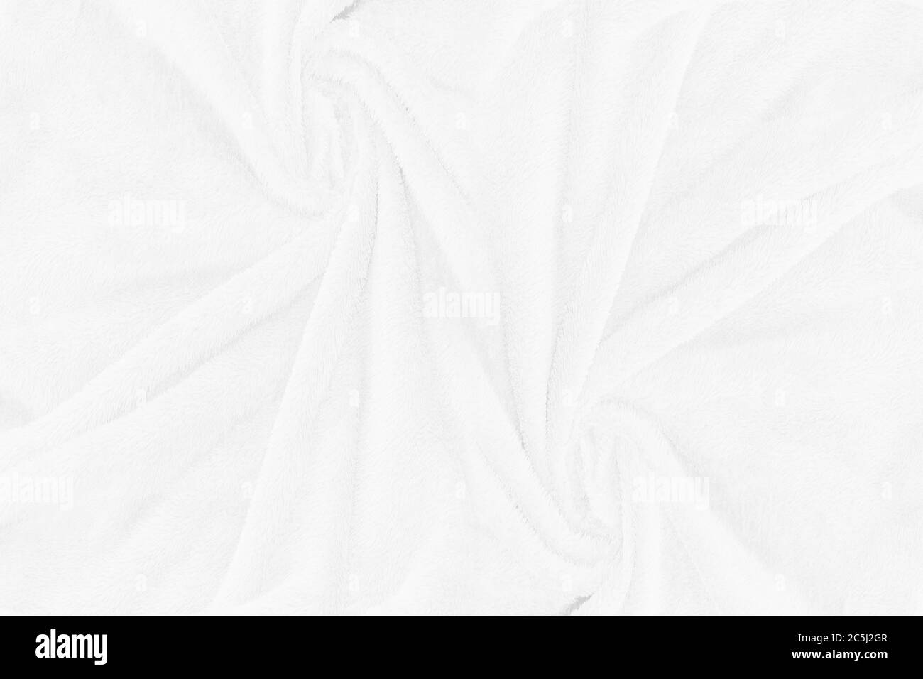 White cloth texture with soft waves. crumpled fabric background. Stock Photo