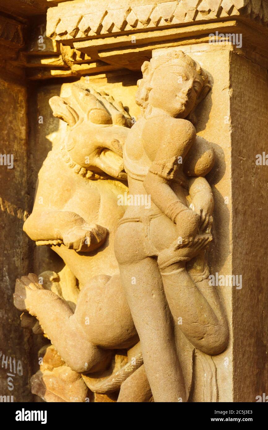 Khajuraho, Madhya Pradesh, India : Surasundari (celestial beauty) Shubhagamini (thorn remover) relief carving in the Kandariya Mahadeva Temple of the Stock Photo