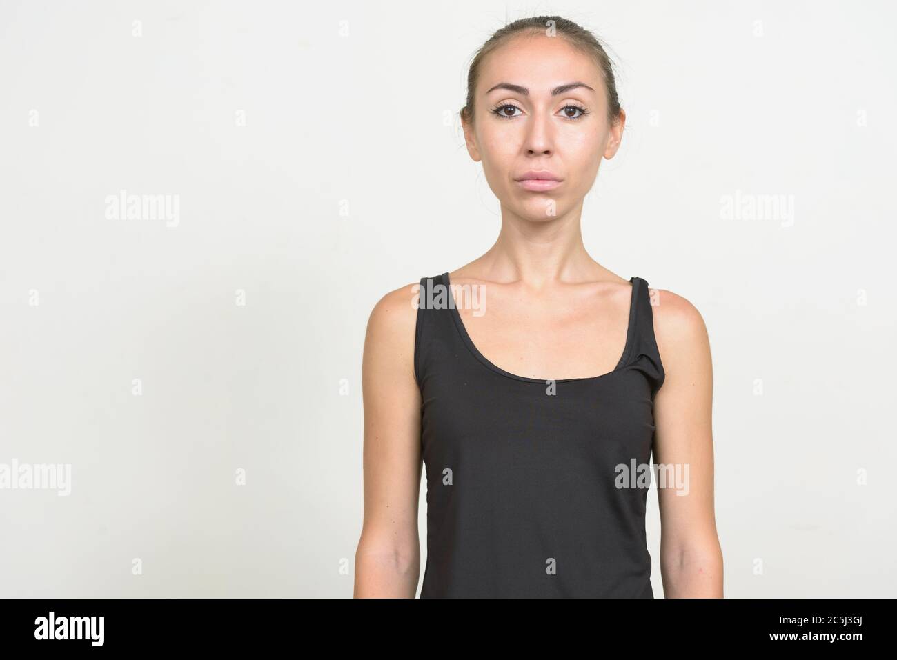 Portrait of young woman with brown hair Stock Photo - Alamy