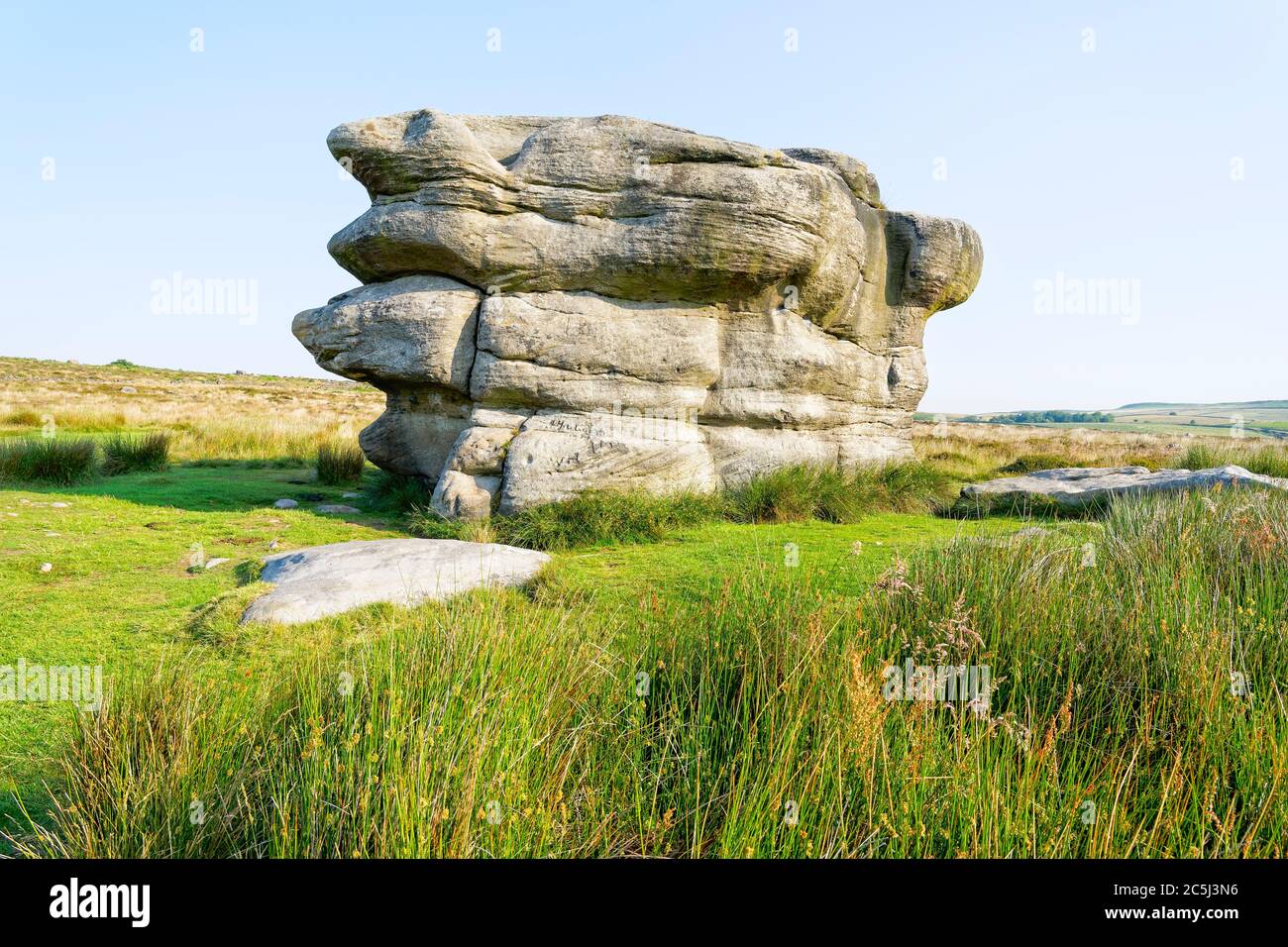 Close up to the Eagle Stone gritstone outcrop on Baslow Edge in the Derbyshire Peak District Stock Photo