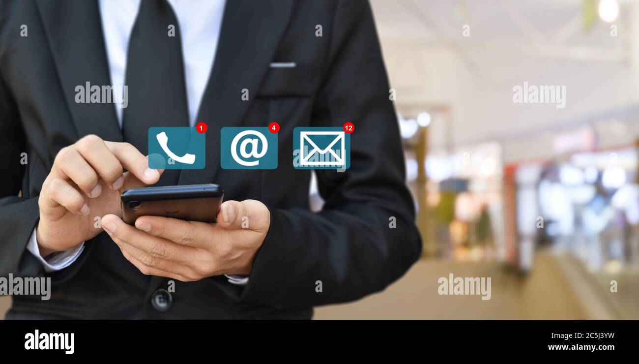 Businessman using mobile smartphone. Concept of Contact Us, customer ...