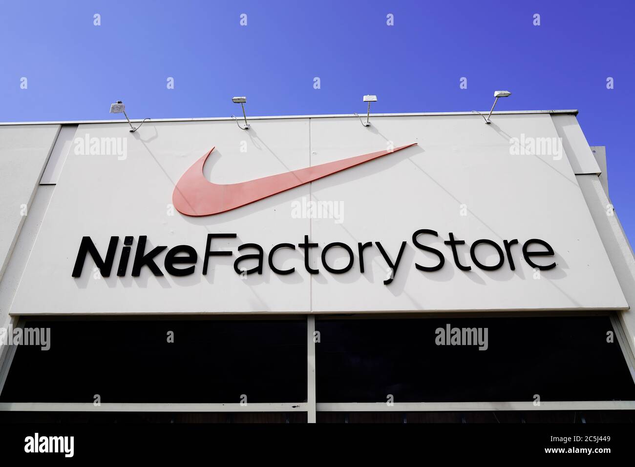 Bordeaux , Aquitaine / France - 07 02 2020 : Nike Factory Store logo and text sign in shop storefront Stock Photo