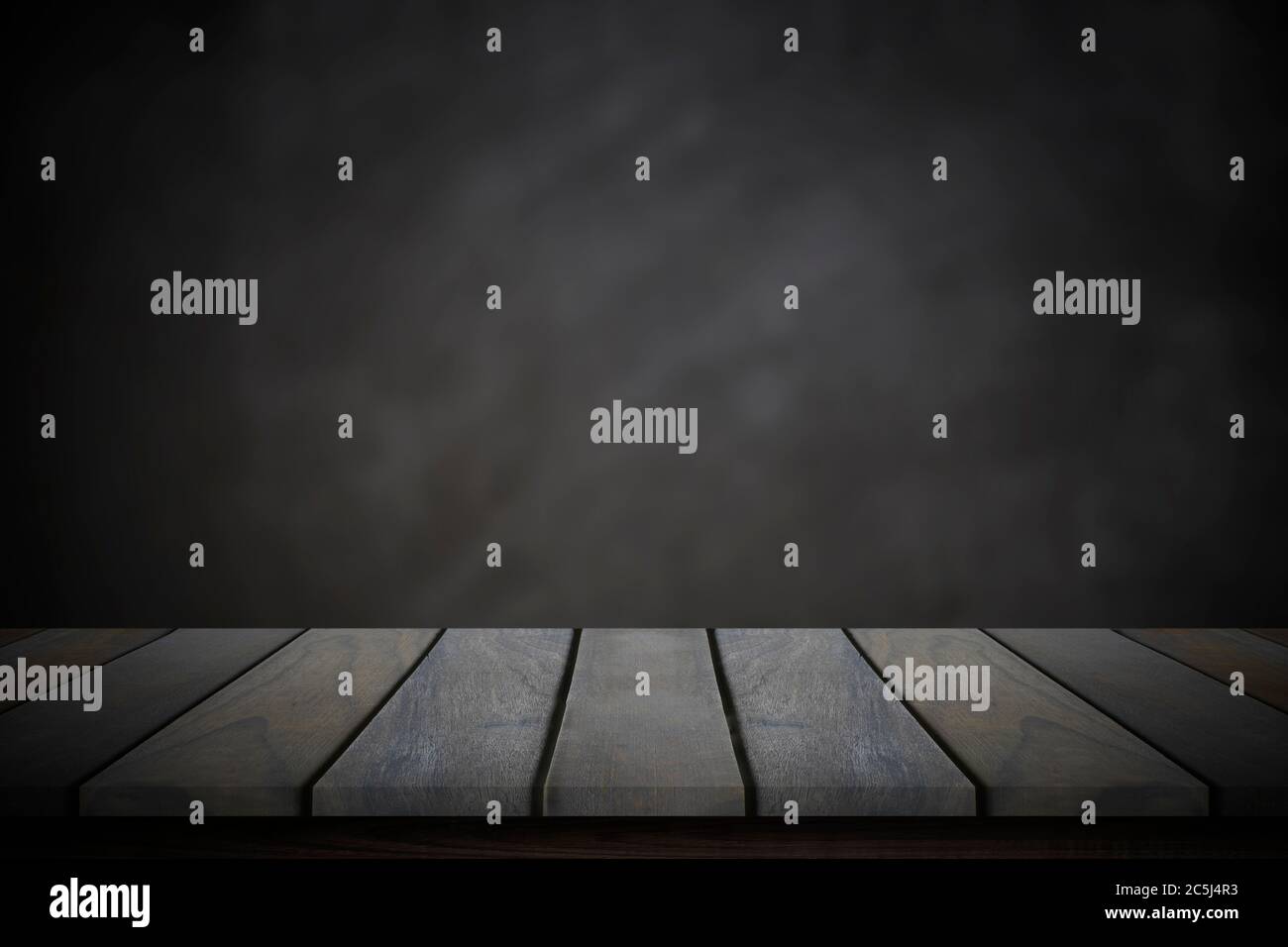 Empty wood table top over blur blackboard background. Stock Photo