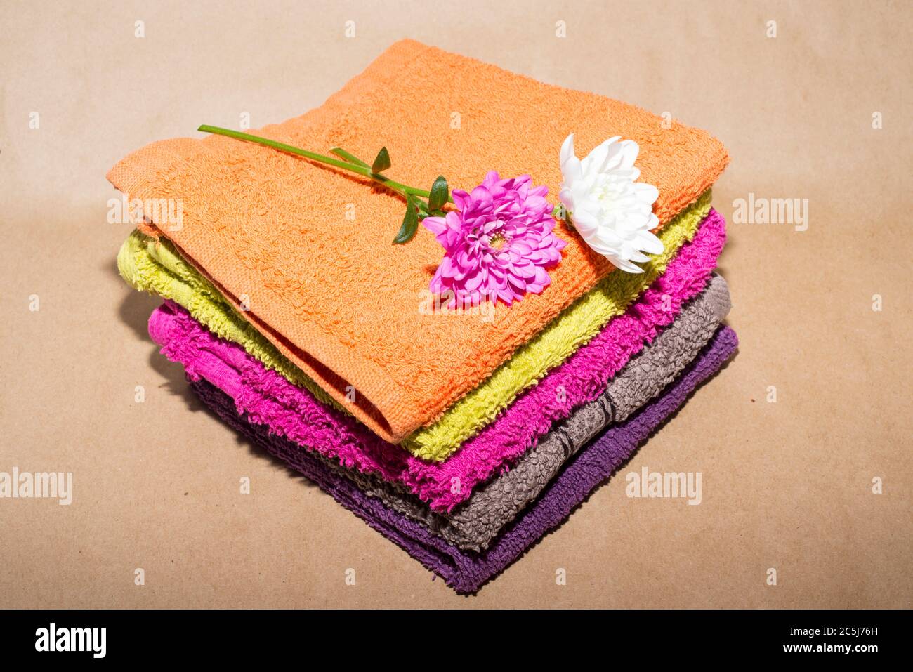 facecloths off various shades with flowers Stock Photo