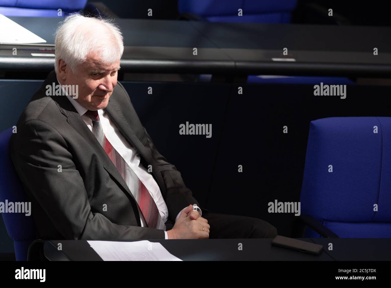 Berlin, Germany. 03rd July, 2020. Horst Seehofer (CSU), Federal Minister of the Interior, sits in the German Bundestag during the plenary session. The main topics of the 171st session of the 19th legislative period will be the adoption of the Coal Exit Act, a topical hour on the excesses of violence in Stuttgart, as well as debates on electoral law reform, the protection of electronic patient data, the welfare of farm animals and the German chairmanship of the UN Security Council. Credit: Christophe Gateau/dpa/Alamy Live News Stock Photo