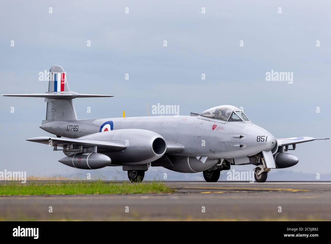 Gloster Meteor F.8 aircraft VH-MBX in Korean War era Royal Australian Air Force (RAAF) markings taxiing down the runway at Avalon airport. Stock Photo