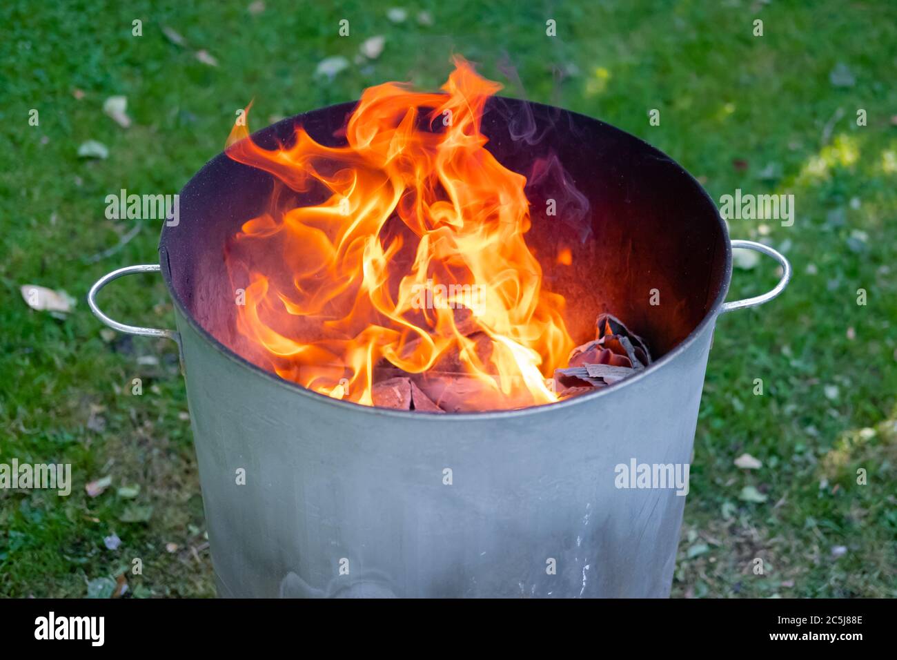 Paper burning in an incinerator Stock Photo - Alamy
