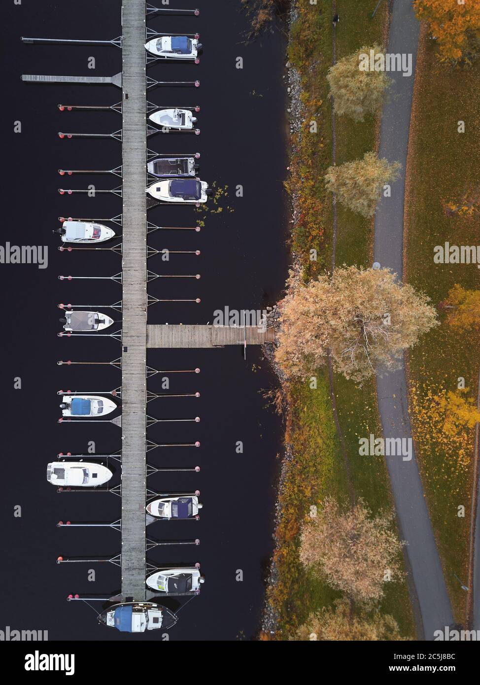 Boat docked at pier hi-res stock photography and images - Alamy