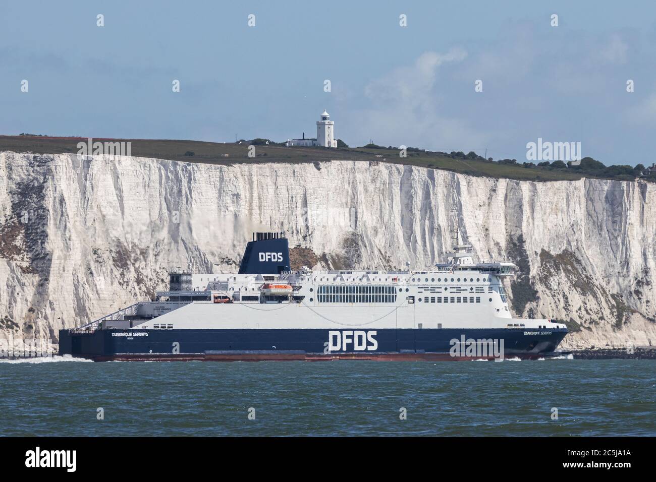DFDS ferry passing white cliffs near Dover Stock Photo