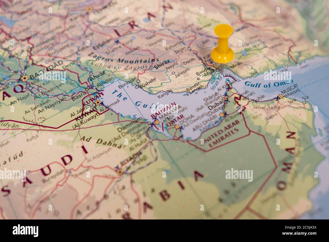 Shallow focus showing the Straight of Hormuz sensitive waterway located in the Persian gulf. Neighbouring, out of focus areas including Iran etc. Stock Photo