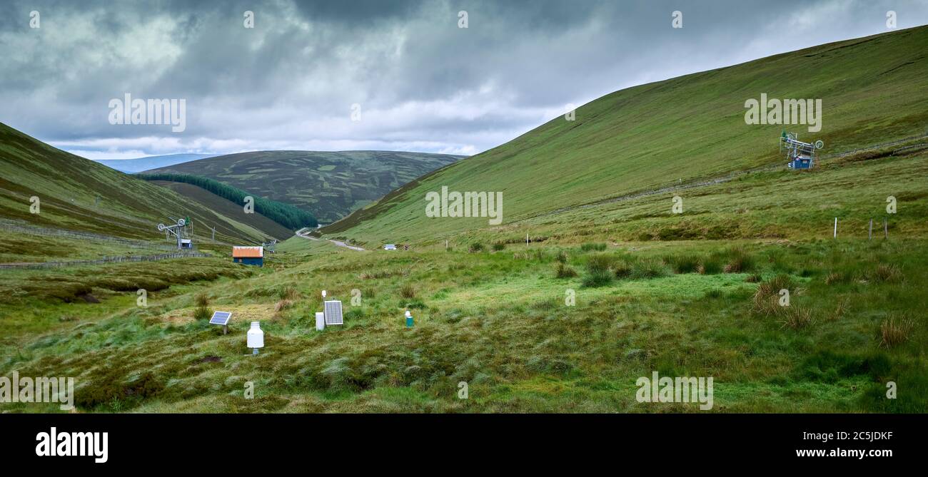 From the Lecht Ski Centre, the A939 winds its way north down to the Bridge of Leachd with Carn Dulack in the background Stock Photo