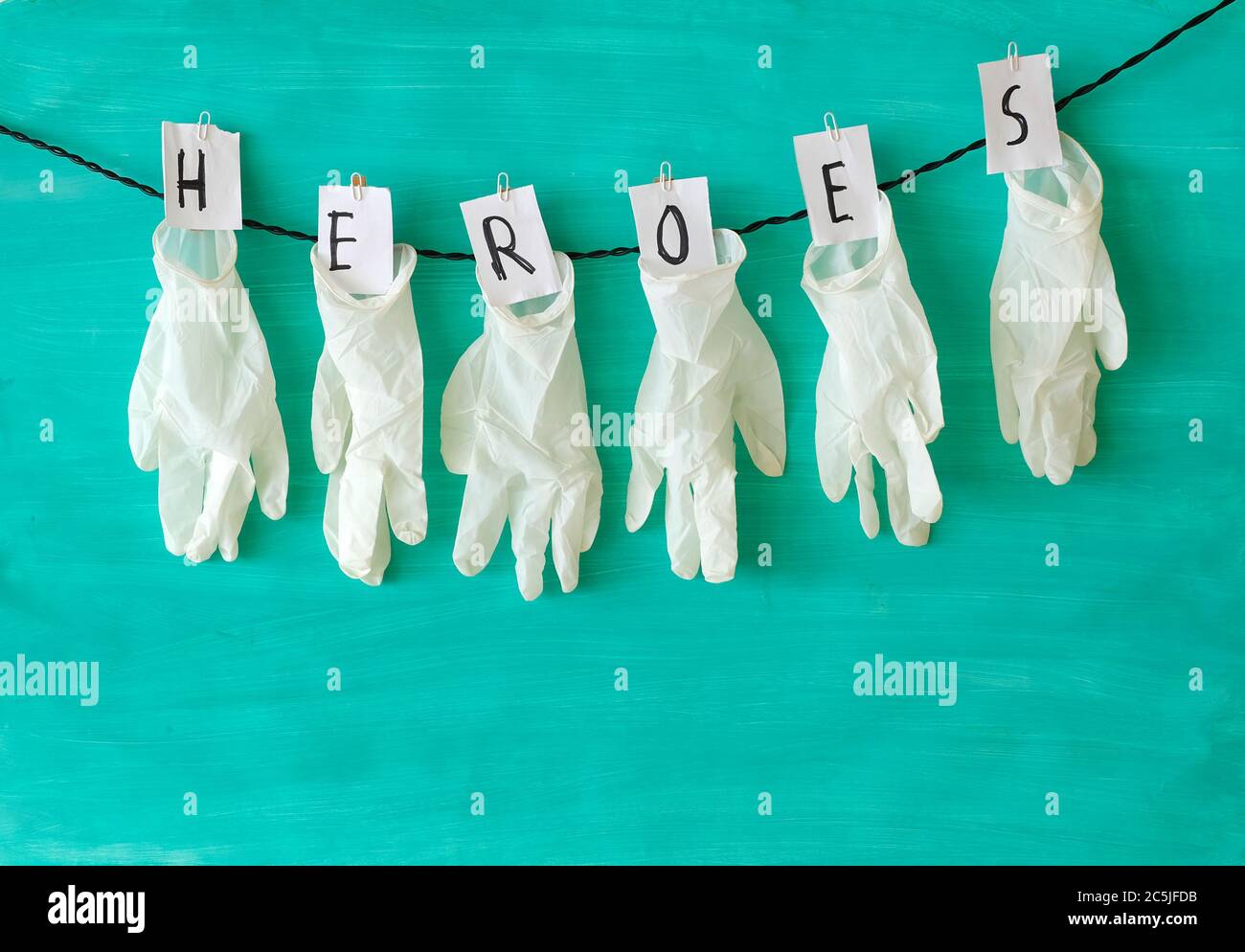 Giiving respect to the health care system, symbol picture,medical ...