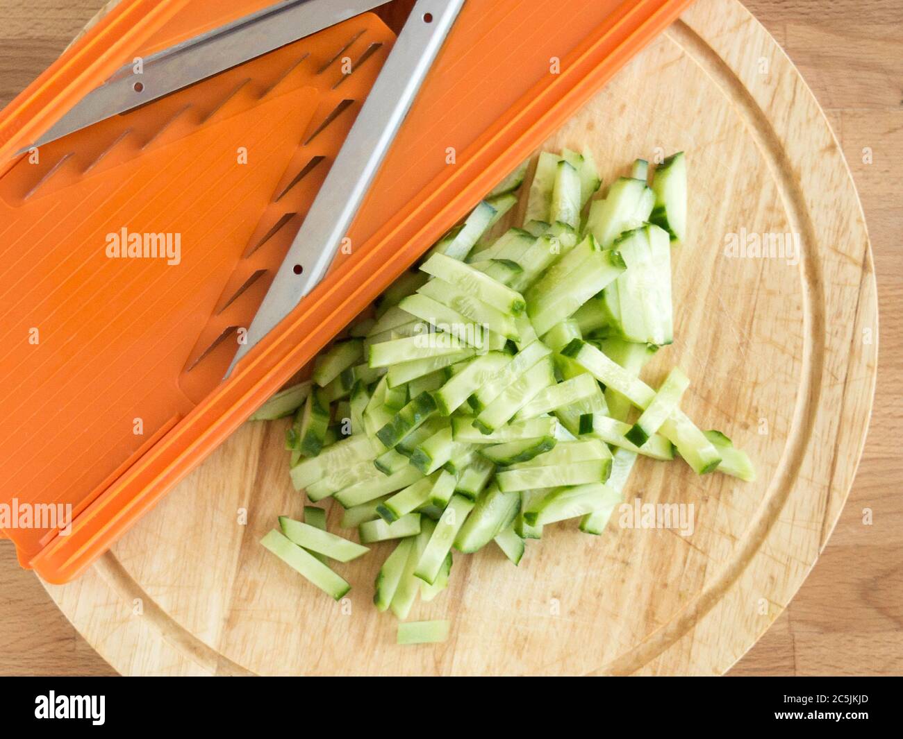 Straw cucumber. Fresh vegetable. Fast vegetable cutter. Stock Photo