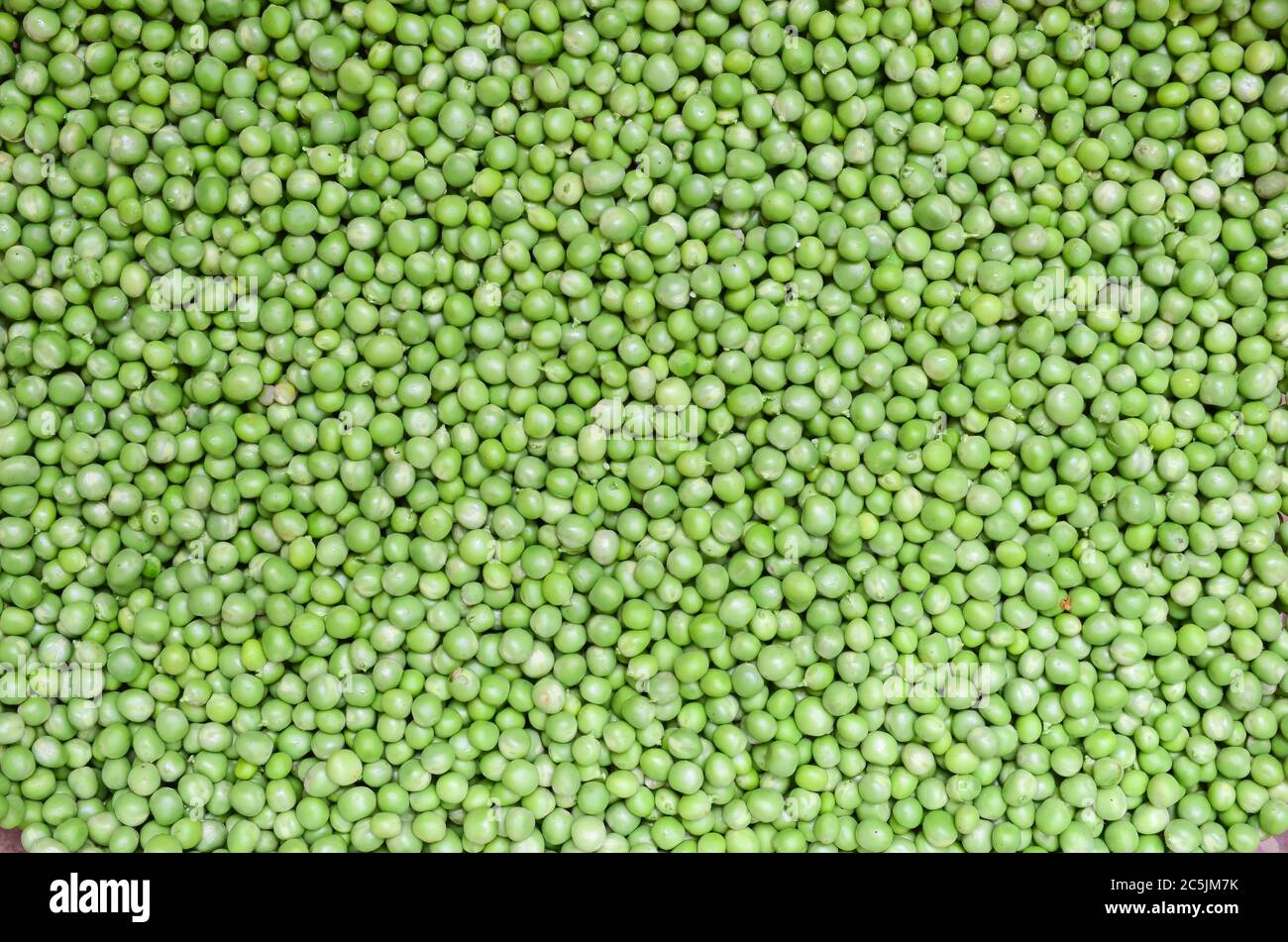 Peas background, full frame of fresh, shelled peas Stock Photo