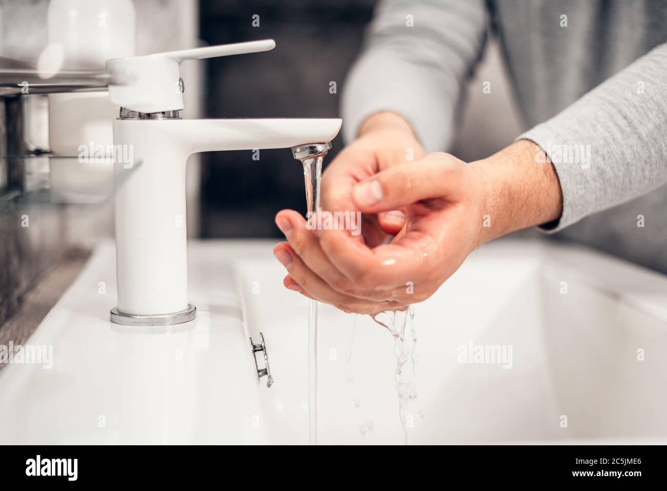 Coronavirus. Proper washing and handling of hands. Liquid antibacterial soap. Self-isolation and hygiene. Stock Photo