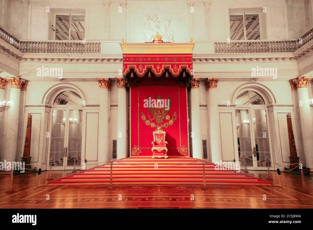 The St. George Hall, with red throne, State Hermitage Museum, St Petersburg, Russia. Stock Photo