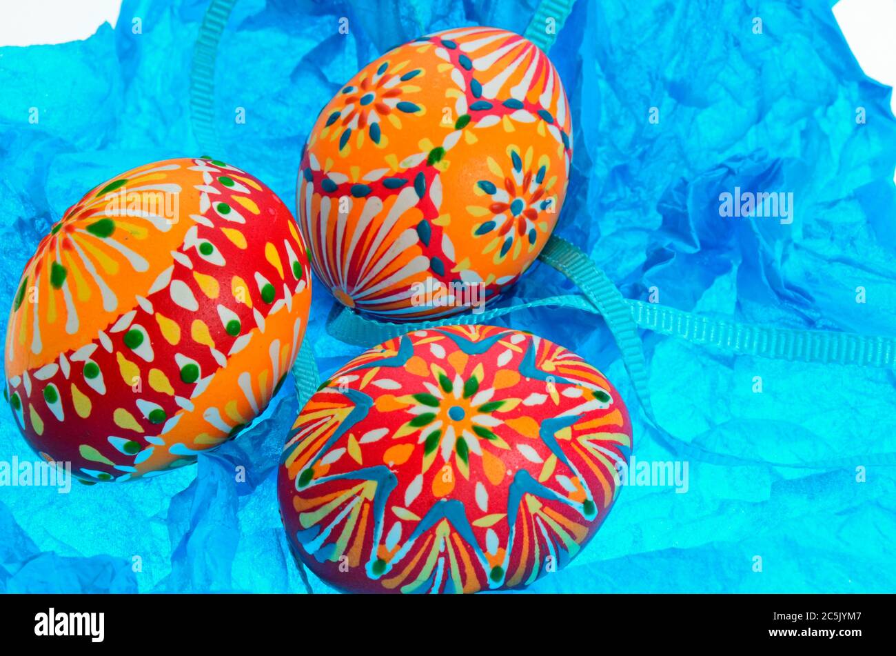 Colorful easter eggs on a blue wrapping paper. Stock Photo