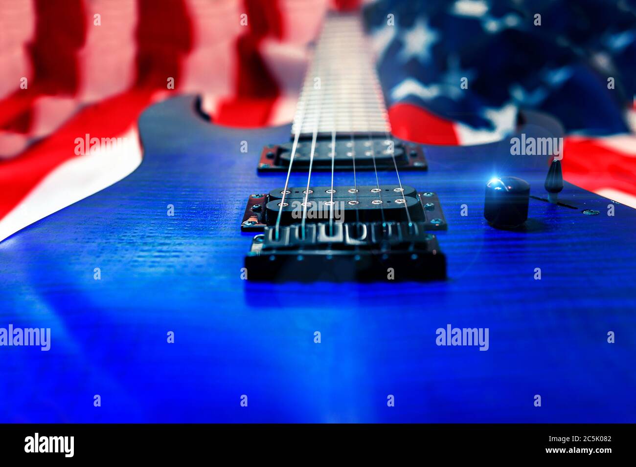 American Rock And Roll Music Concept With American Flag Electric Guitar Stock Photo