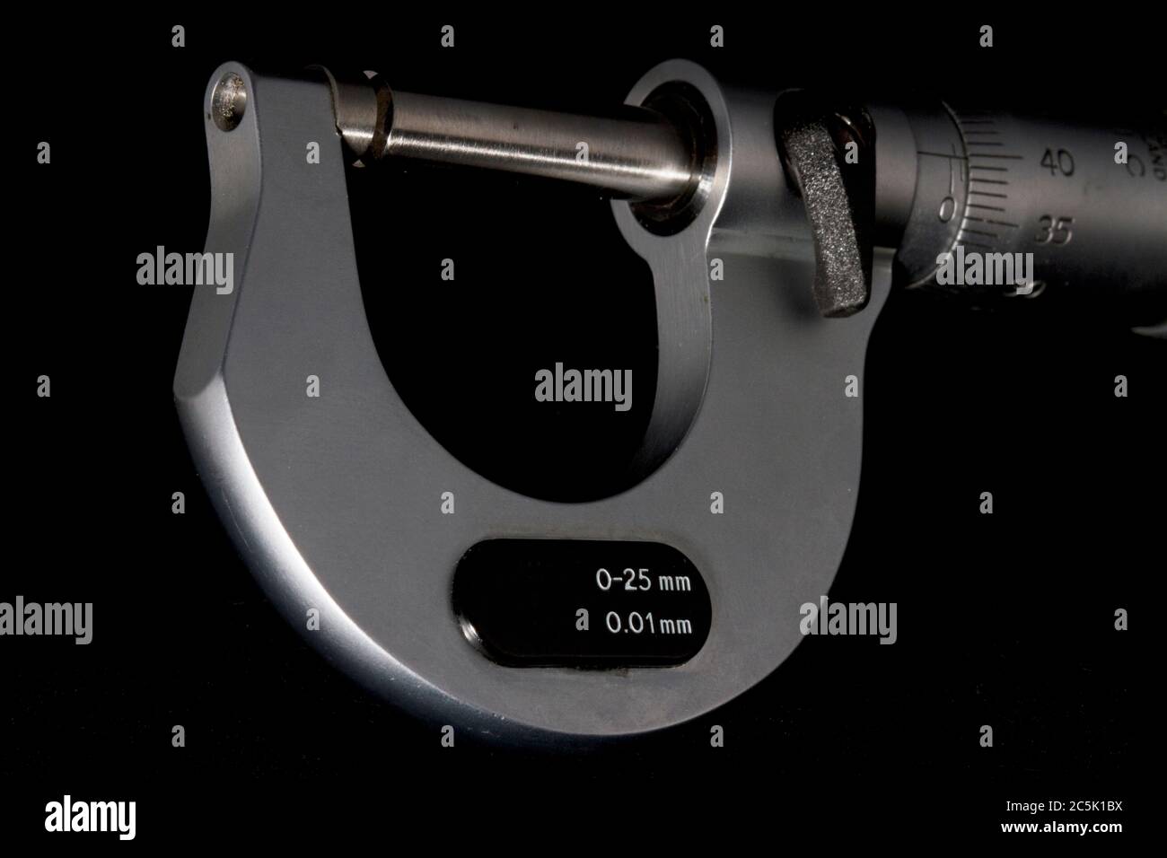 This is a close up image of an engineering micrometer used for the