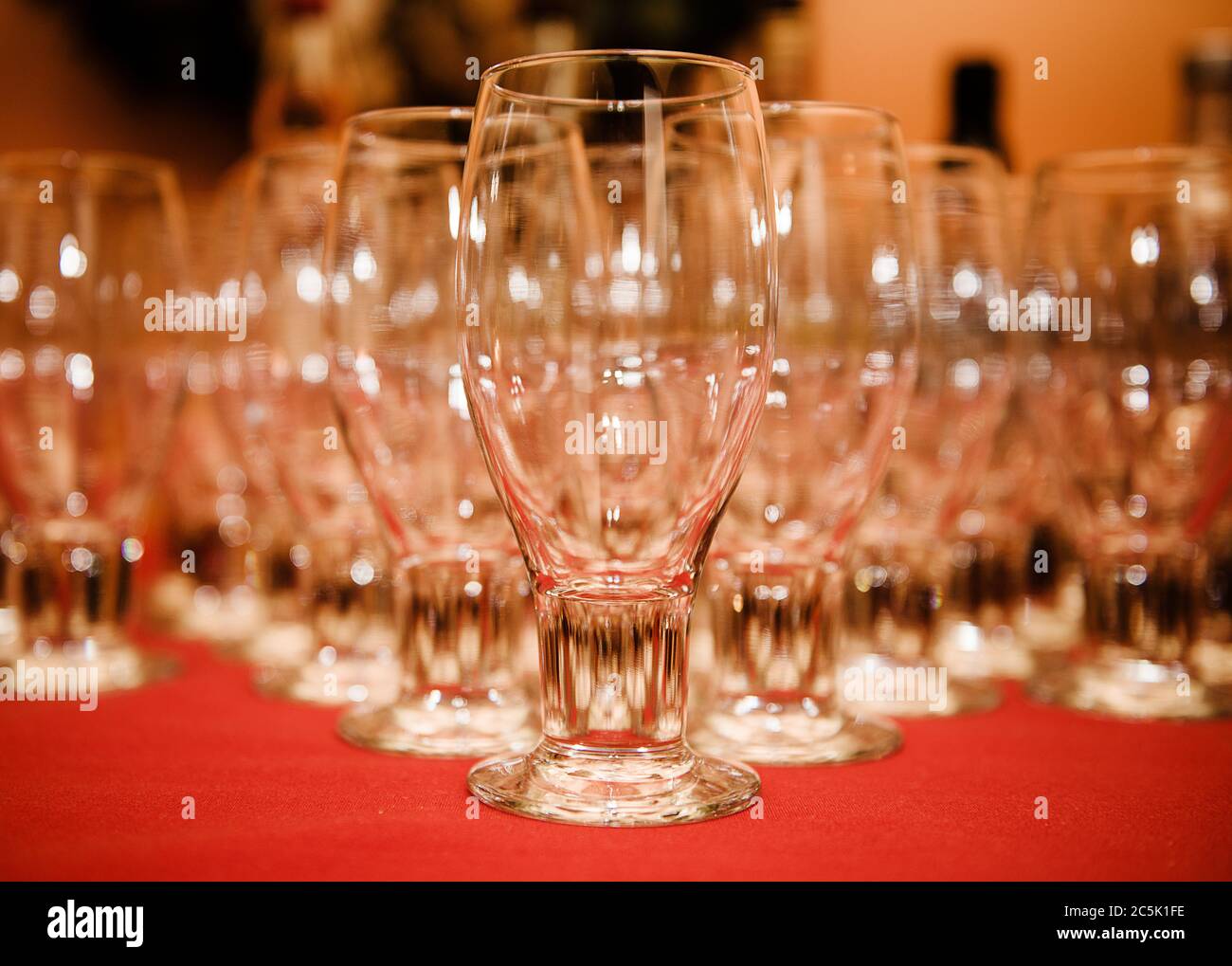 Empty beer glasses ready to be filled at an event Stock Photo