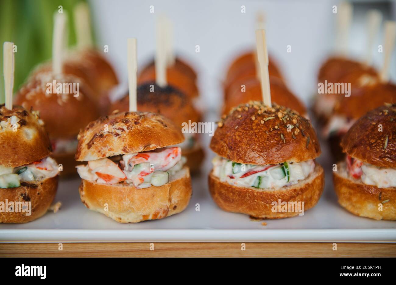 platter of small sandwiches at a buffet Stock Photo