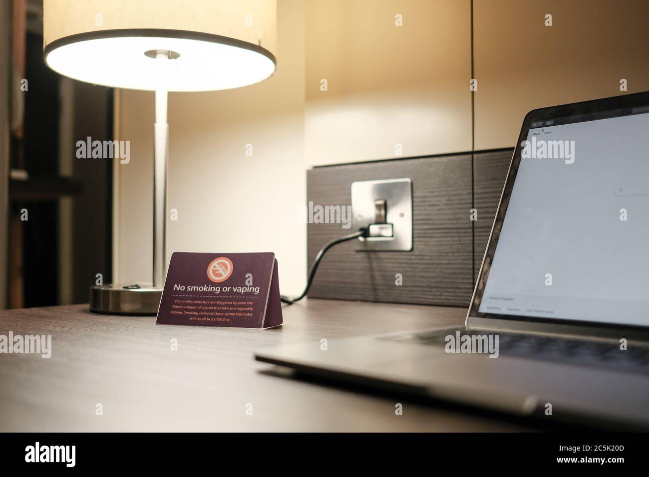Vaping sign seen on a work desk with a premiumpriced hotel room. The