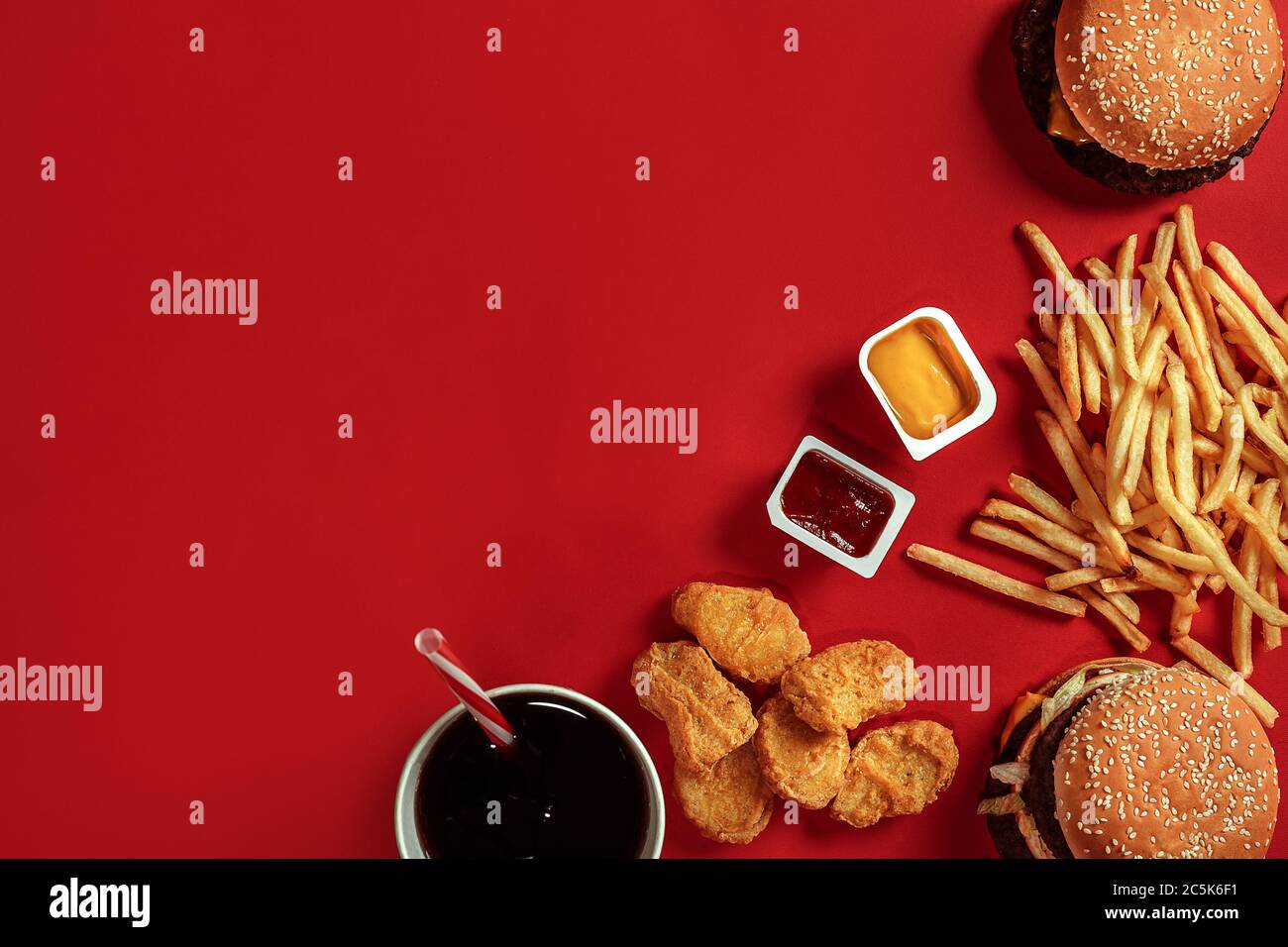 Burger and Chips. Hamburger and french fries in red paper box. Fast
