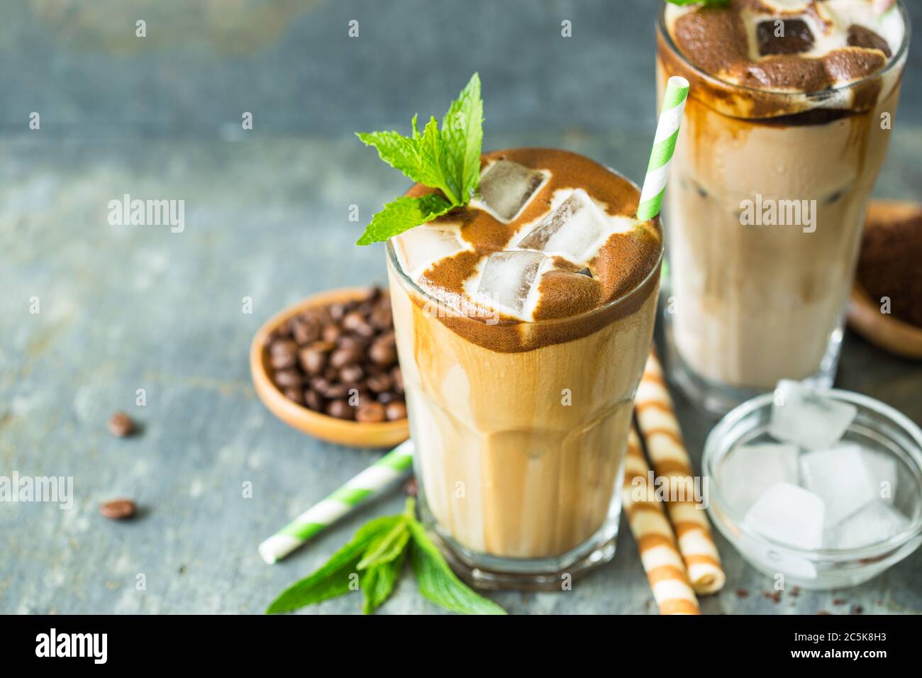 Iced latte coffee in a tall glass Stock Photo - Alamy