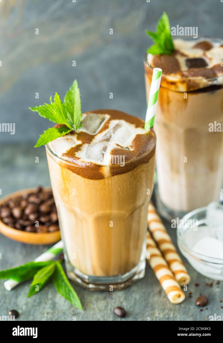 Iced latte coffee in a tall glass Stock Photo - Alamy