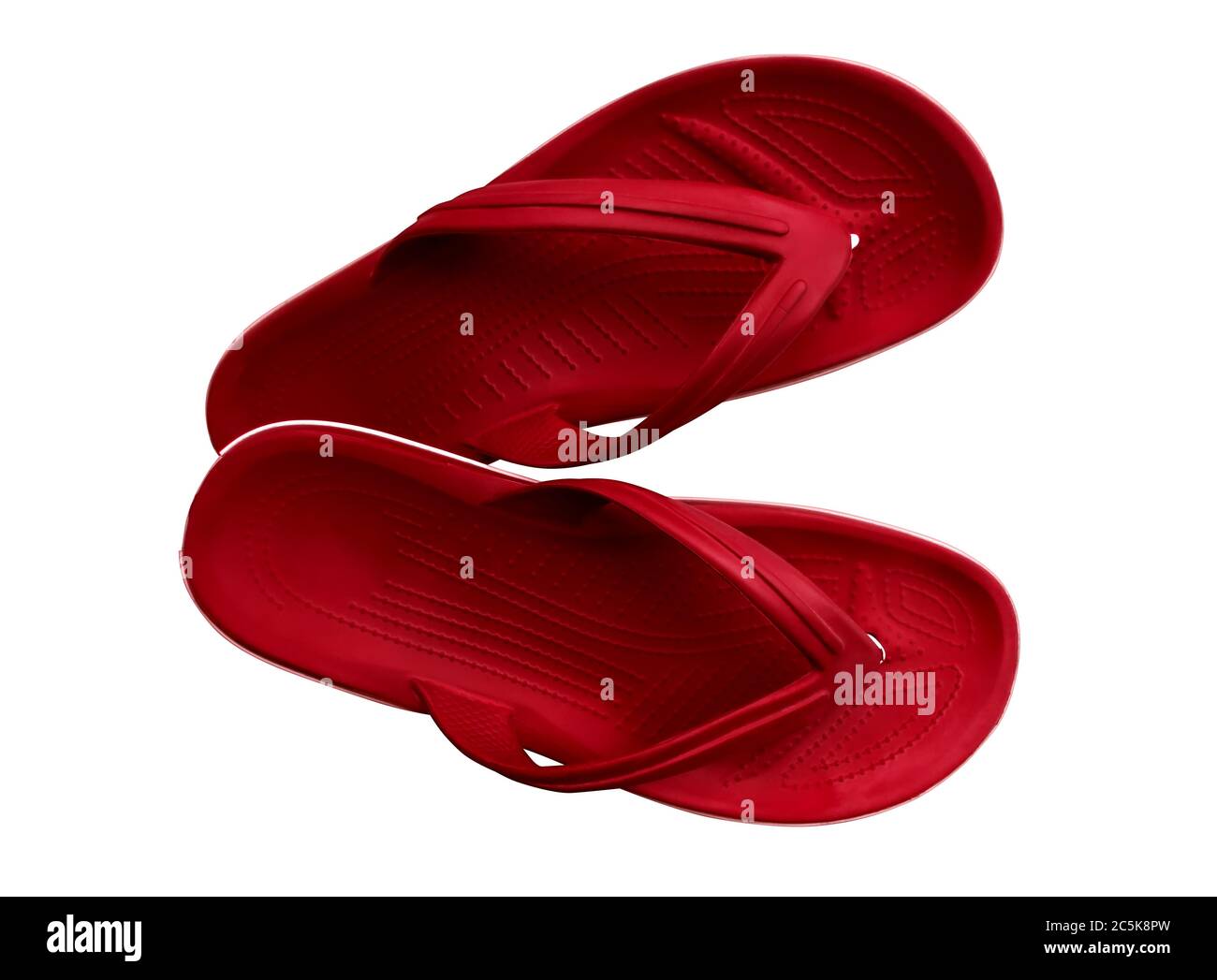 Red rubber slippers isolated on a white. Clipping Path included Stock